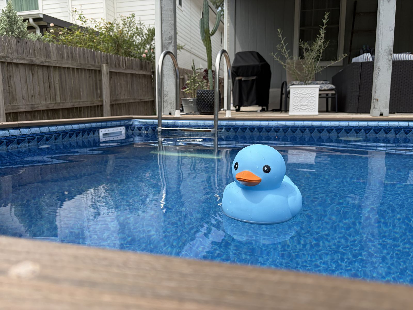 Modern semi-inground pool design with deck option